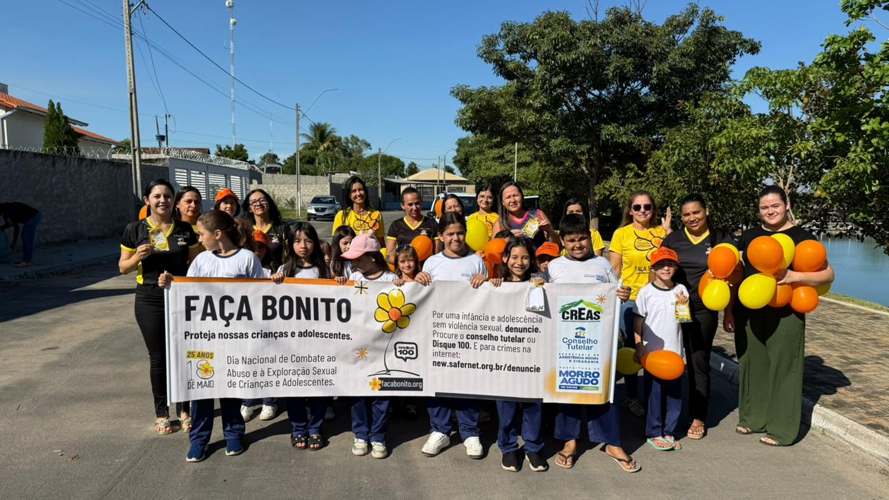 Alunos da rede municipal participam de plantio de girassóis no Lago Municipal em ação do Maio Laranja